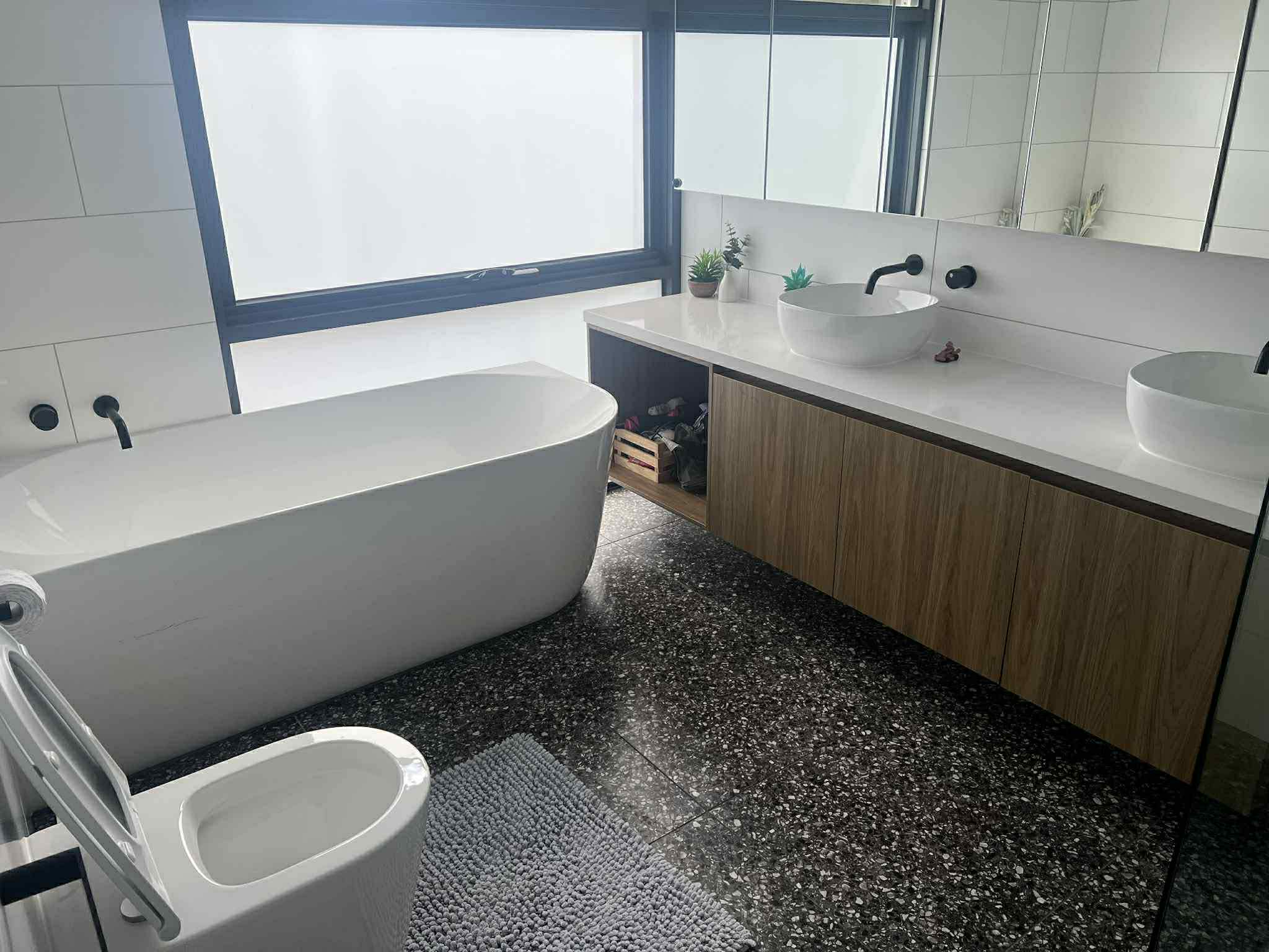 Freshly cleaned bathroom showcasing a polished finish