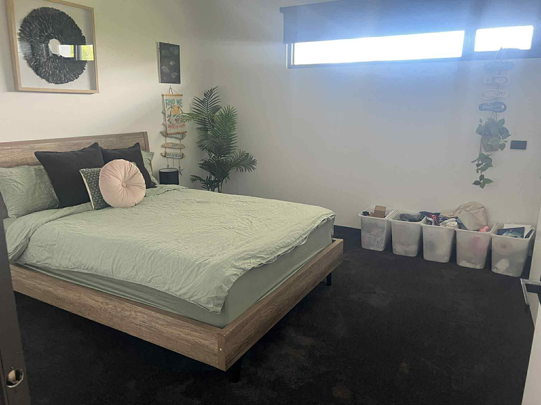 Freshly cleaned bedroom showcasing a neat finished result